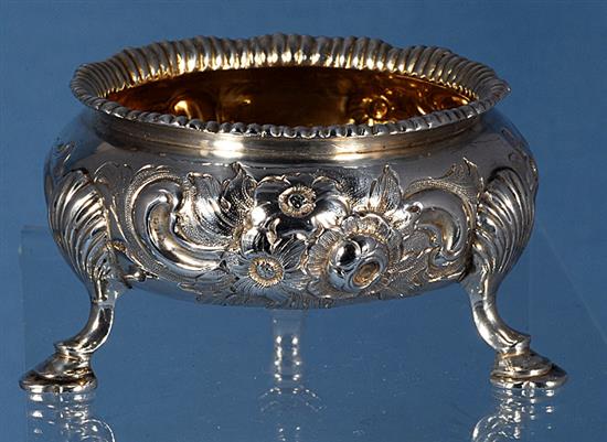 A set of four Victorian embossed silver table salts, by Roberts & Briggs, height 47mm, weight 12.8oz/401grms.